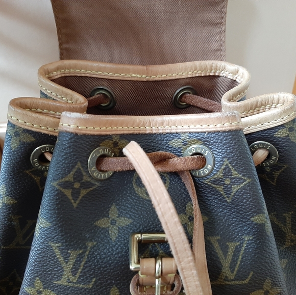 Louis Vuitton backpack 1/2 listing - Picture 11 of 16